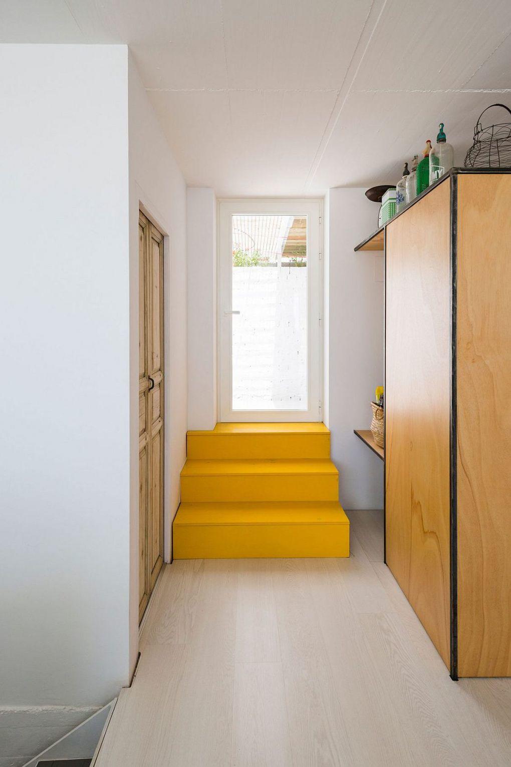 Gaucin | Colorful staircase in yellow inside the Spanish house 1